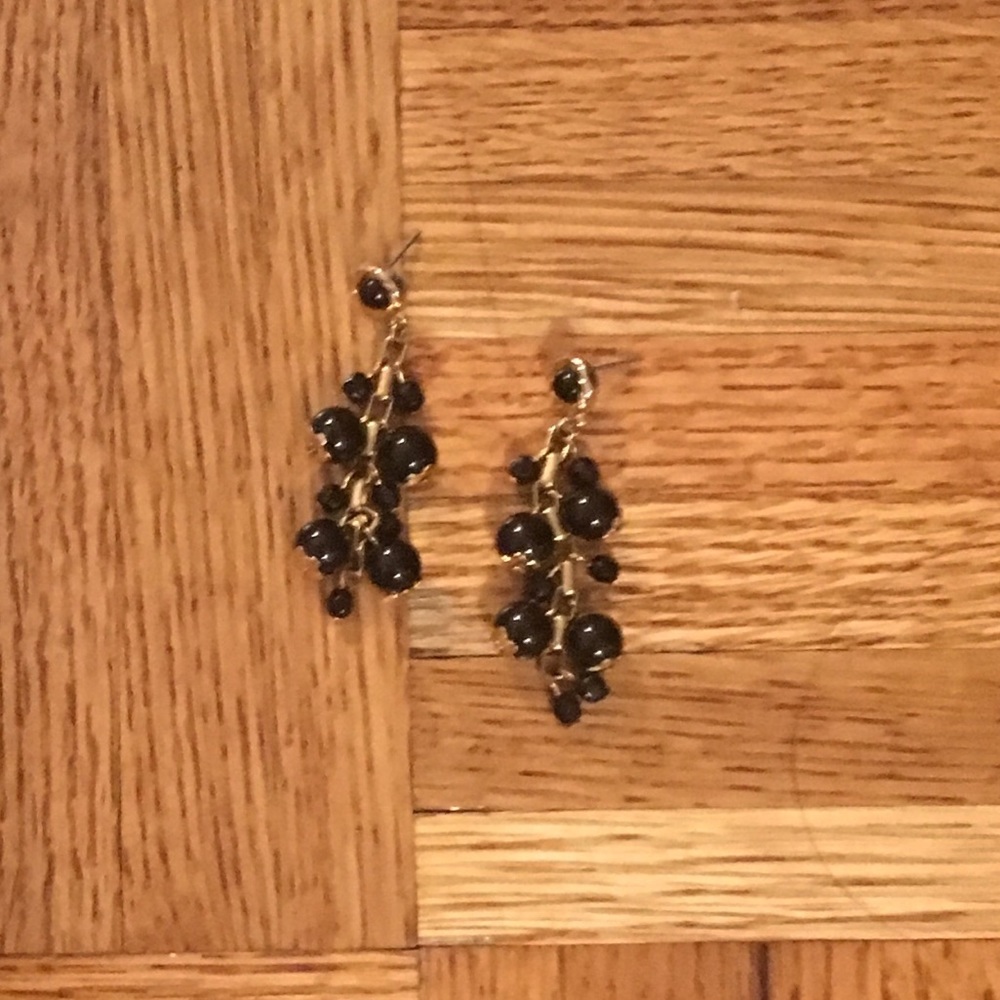 Gold and black dangling earrings